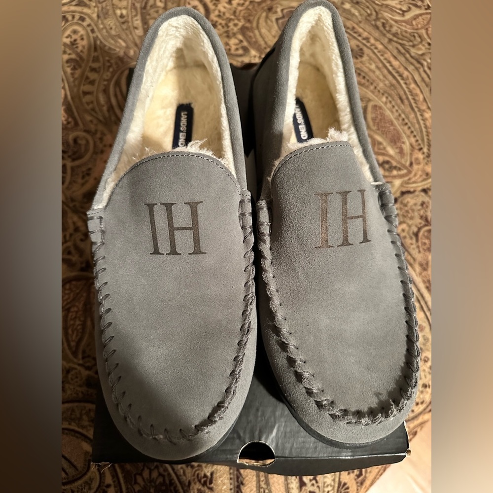 Lands End house shoes never worn. Hard sole